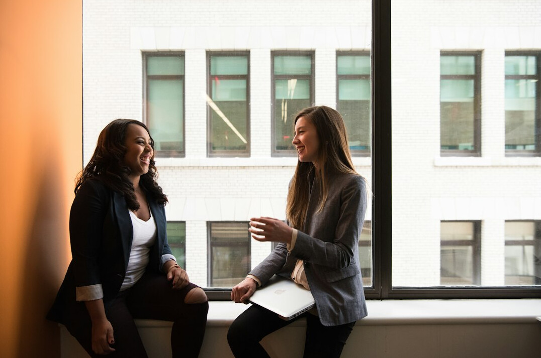 happy coworkers chatting