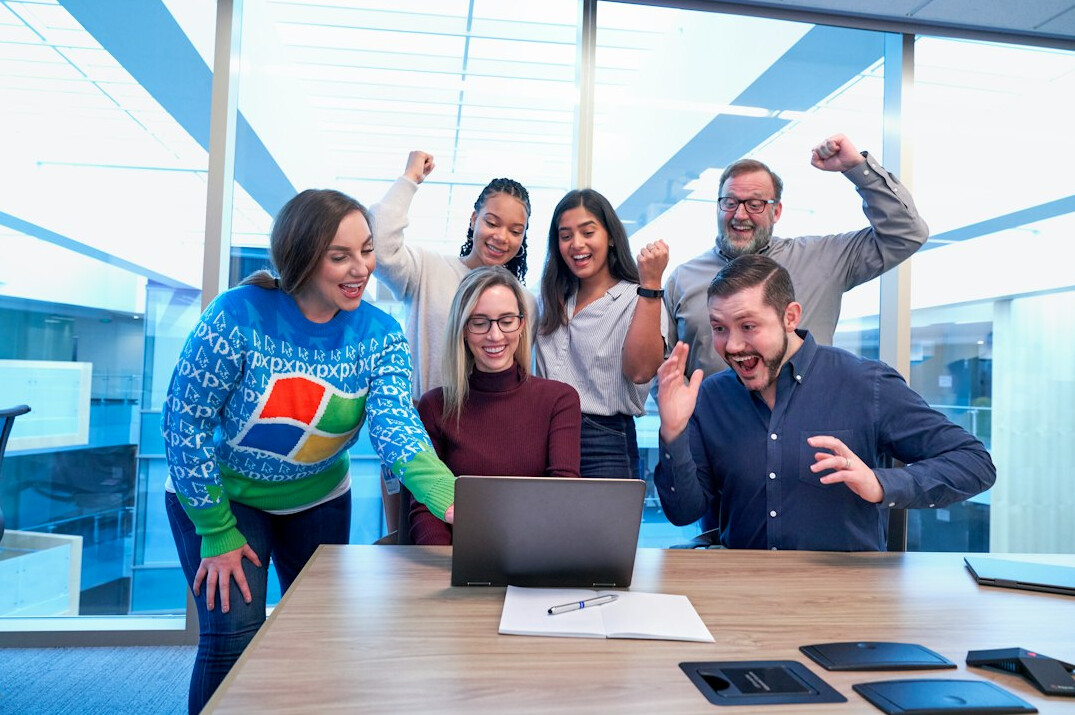 happy team celebrating success